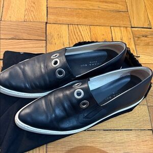 Barbara Bui Black Leather Slip-On Loafers with Silver Eyelets